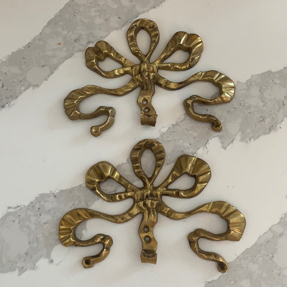 - Vintage brass bow hooks (2)